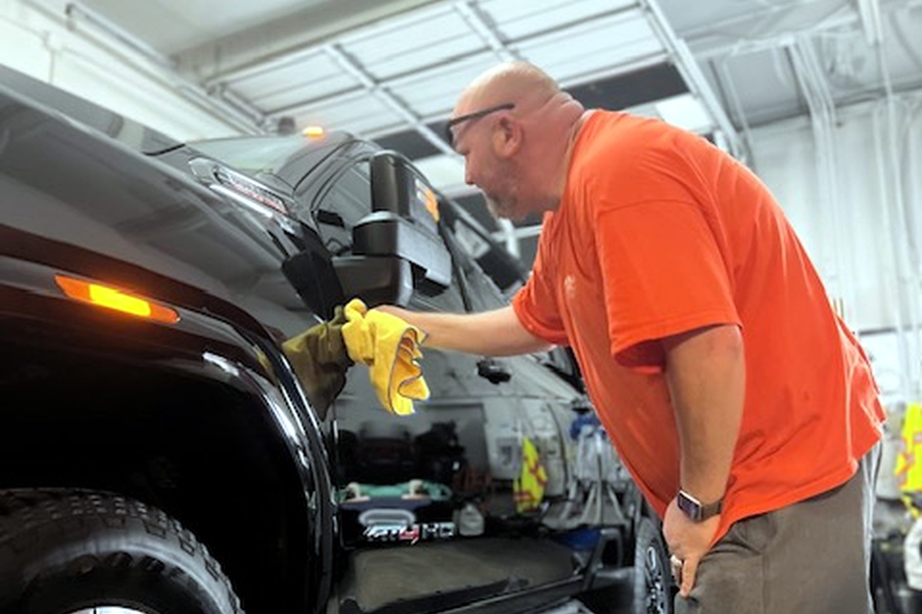 Hand polish on a black truck — car wax Wilmington NC, hand wax near me
